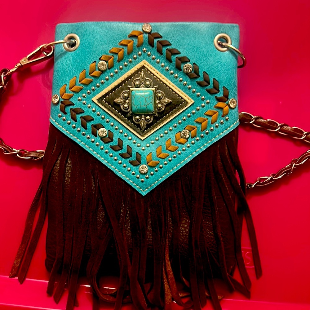 Small outing purse. Super cute. Leather.